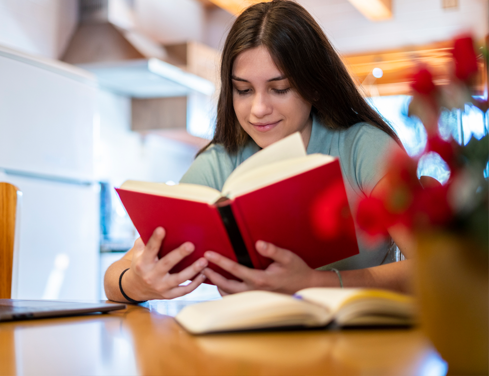 A person reads a book.