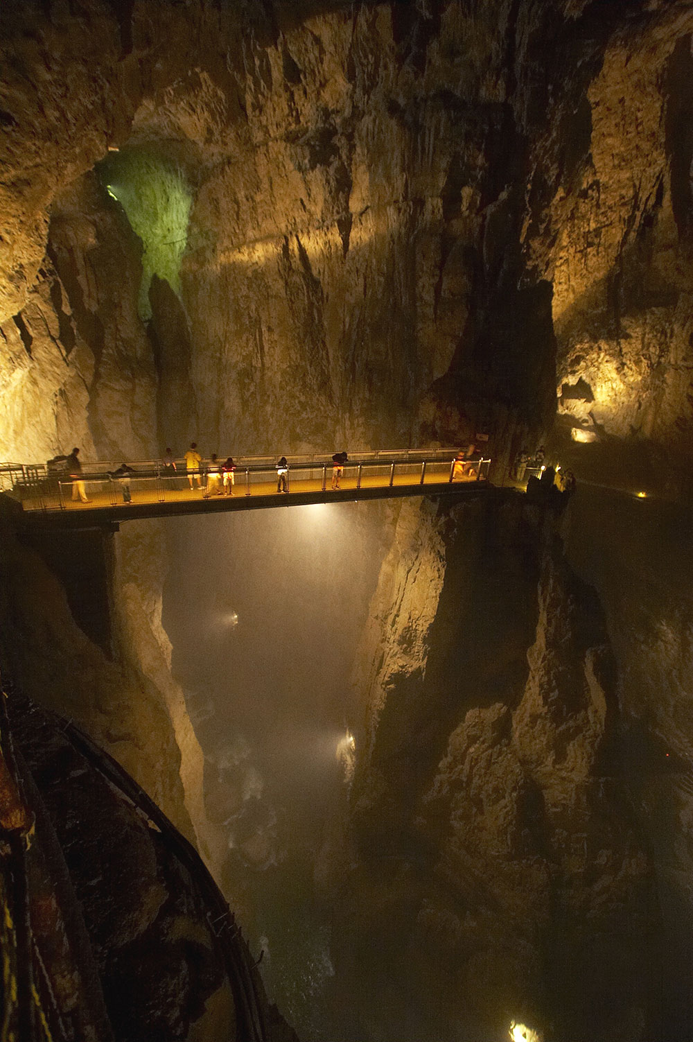 underground cave with brige crossing large gap